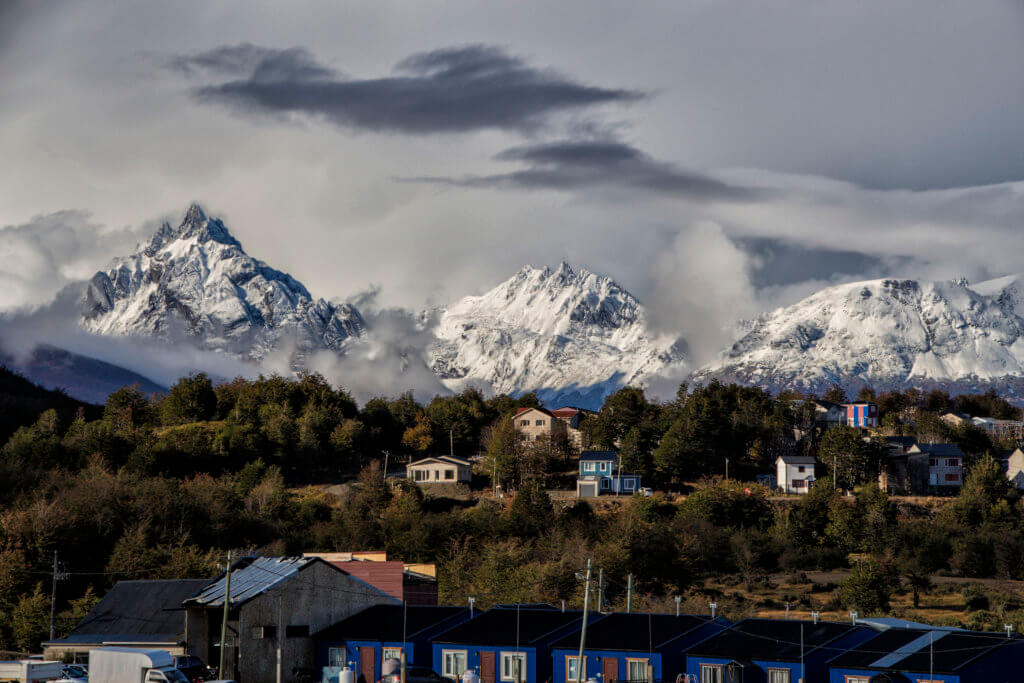 View of Ushuaia with snowcapped mountains in the background